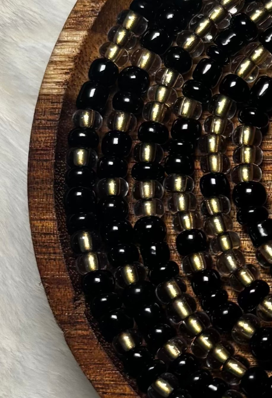 “Dark romantic waist beads with blush accents by Waisted By Design”