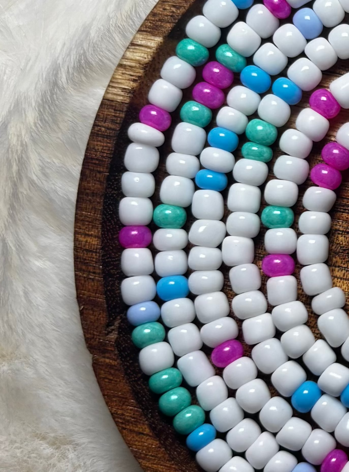 “Soft pink and blue waist beads inspired by cotton candy by Waisted By Design”