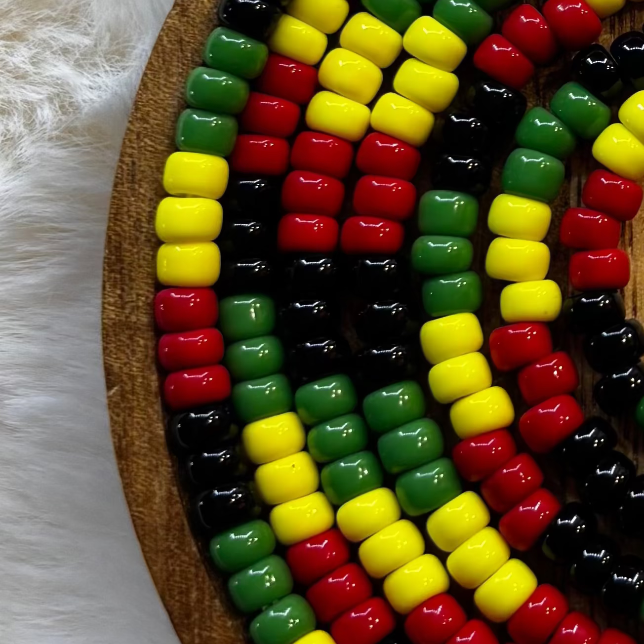 “Rasta inspired waist beads in red gold and green by Waisted By Design”