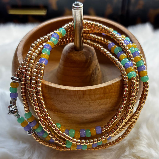 “Festive multicolor waist beads inspired by Mardi Gras by Waisted By Design”