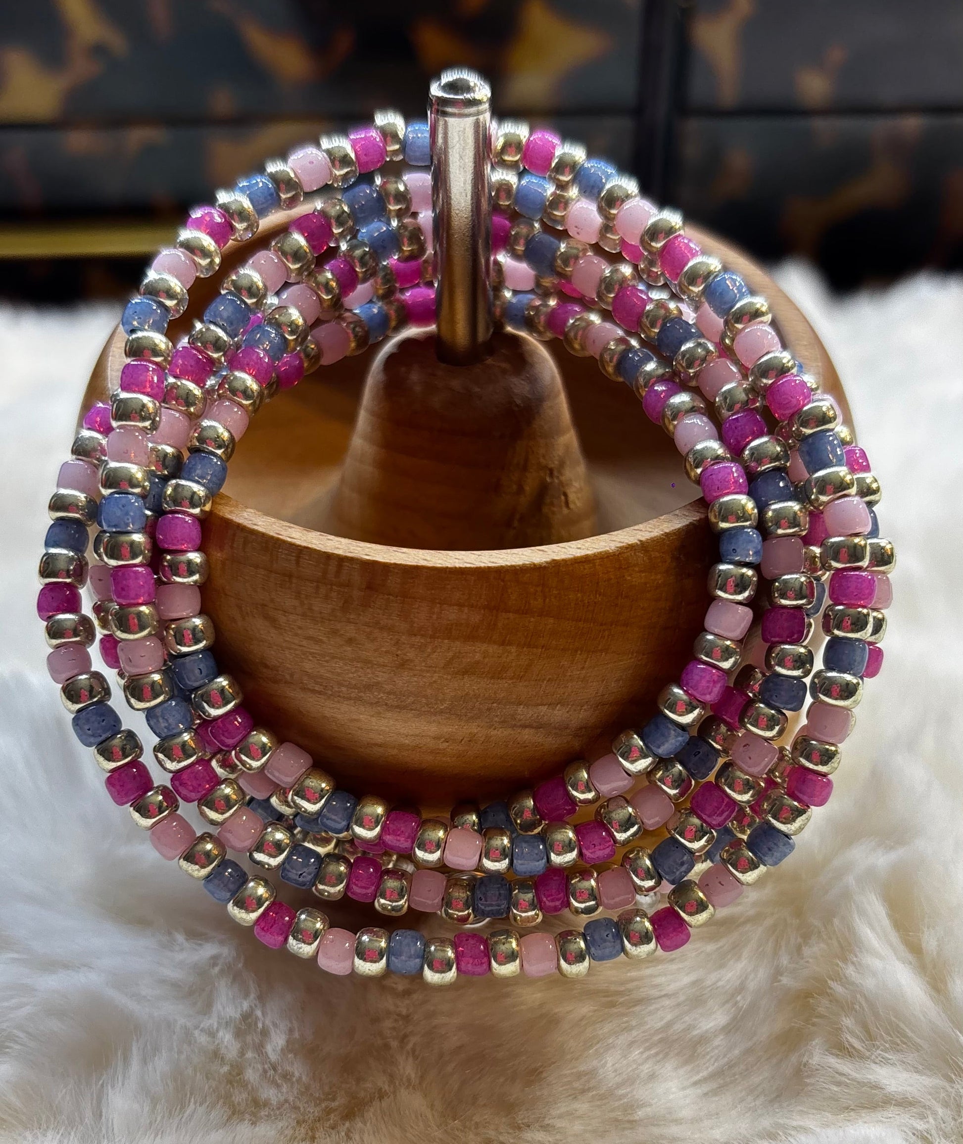 “Romantic waist beads in soft pink and red tones by Waisted By Design”