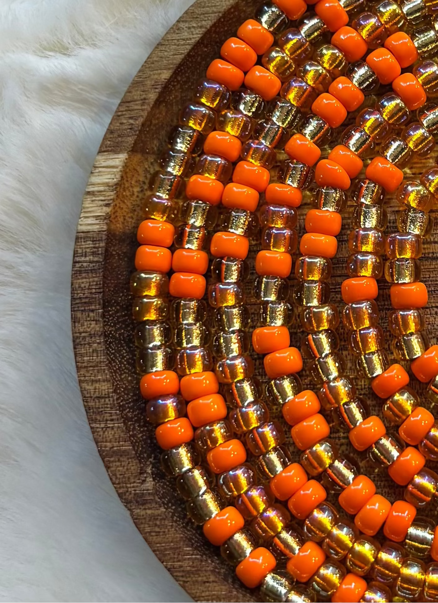 “Waisted By Design luxury waist beads with bold captivating color blend”