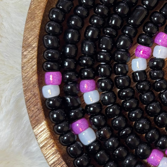 “Bold vibrant waist beads with cosmic inspired colors by Waisted By Design”