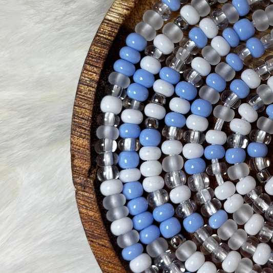 “Cool toned waist beads with icy blue and white accents by Waisted By Design”