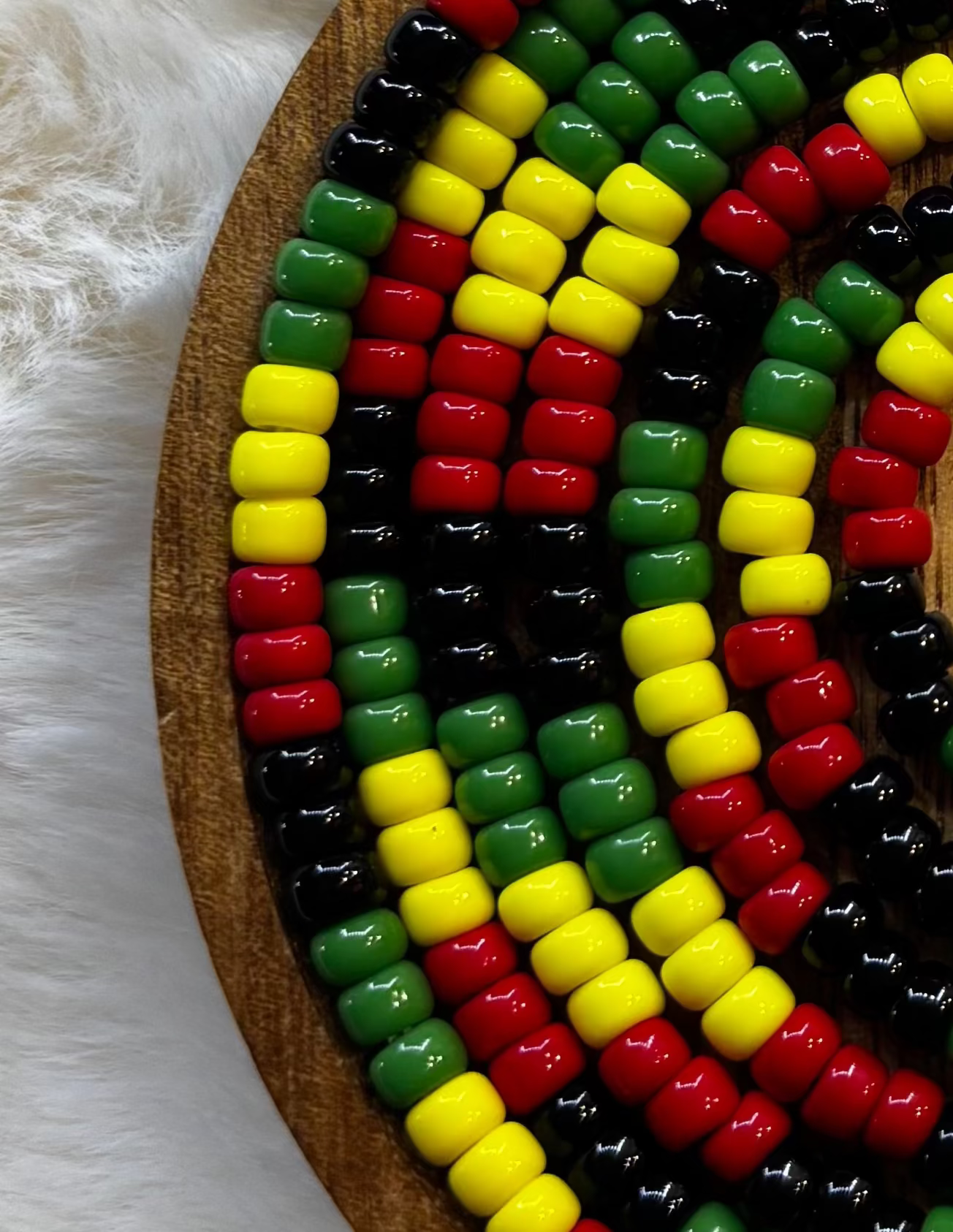 “Rasta inspired waist beads in red gold and green by Waisted By Design”